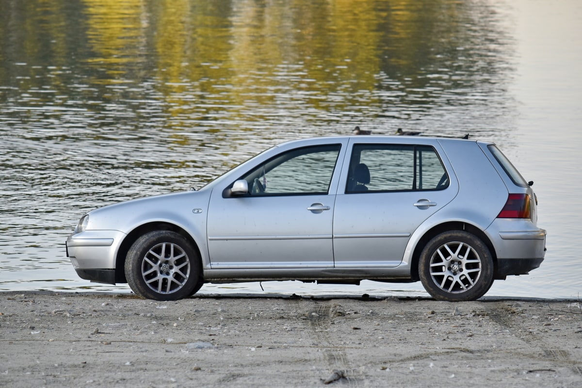 Car by the riverside